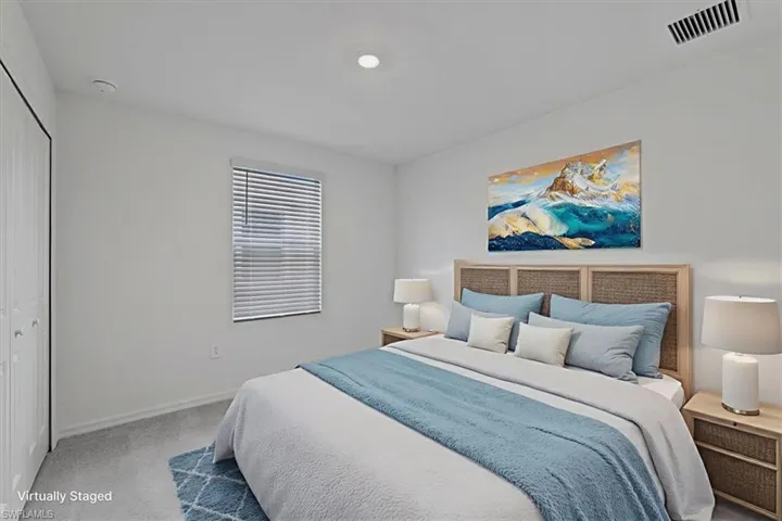 Bedroom featuring a closet and carpet floors