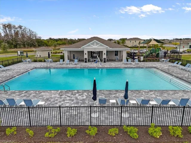 Community pool featuring a patio area
