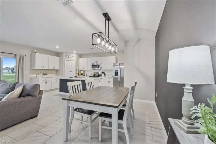 Dining space with recessed lighting