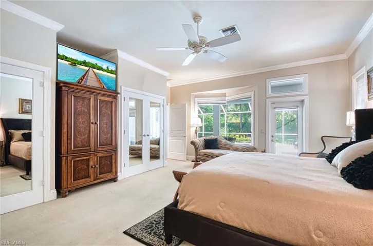 Door to Lanai and pool off Primary Bedroom.