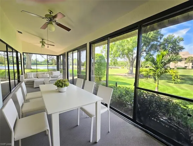 VIRTUALLY STAGED Glass Enclosed Lanai w/View of Lake & Golf Course