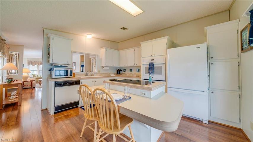 Clean. Crisp. Fully Functional. Newer appliances and a pass-through window; perfect for entertaining.