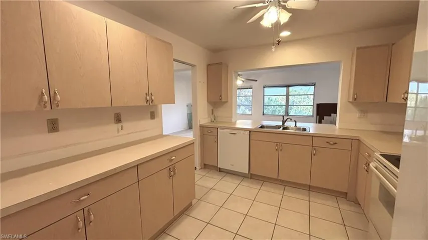 No shortage of cabinets and countertops in this spacious Kitchen.