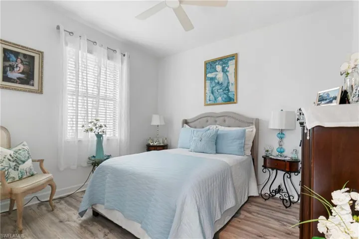 Bedroom featuring light wood-type flooring and a ceiling fan