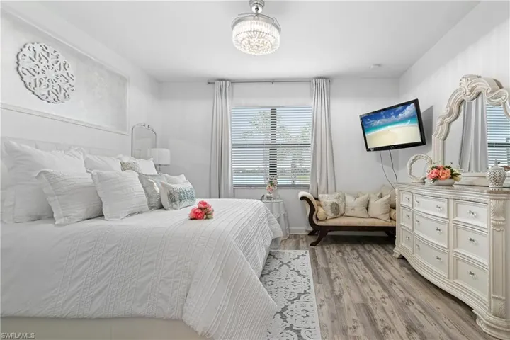 Bedroom with wood finished floors