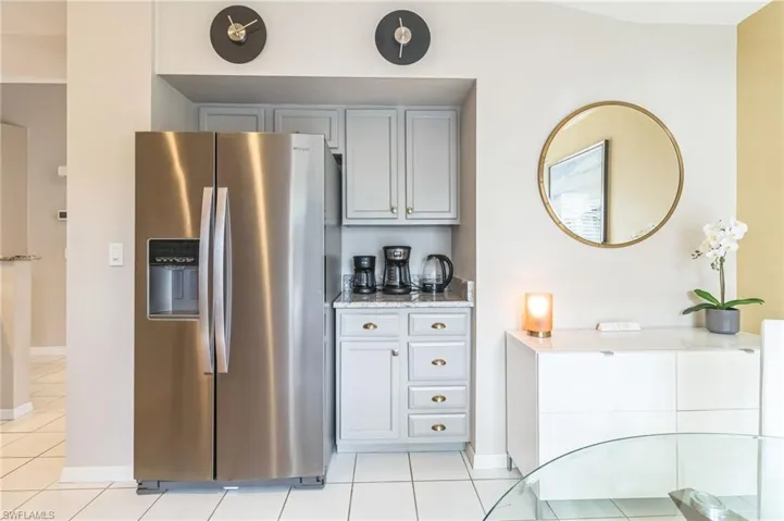 Ample cabinetry makes a great coffee station