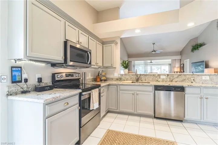 Stainless appliances and granite counters in the kitchen