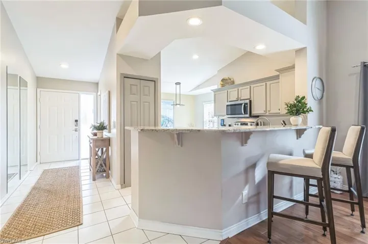 Entry foyer features a coat closet