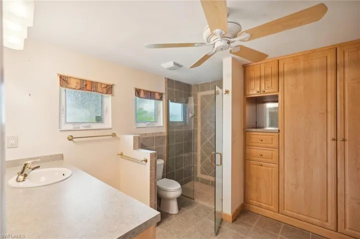 Master Bathroom featuring recently updated and built in closets, walk-in shower and more1