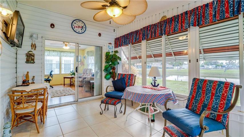 A bonus room and a sunroom? Yes! Both with a lake view.