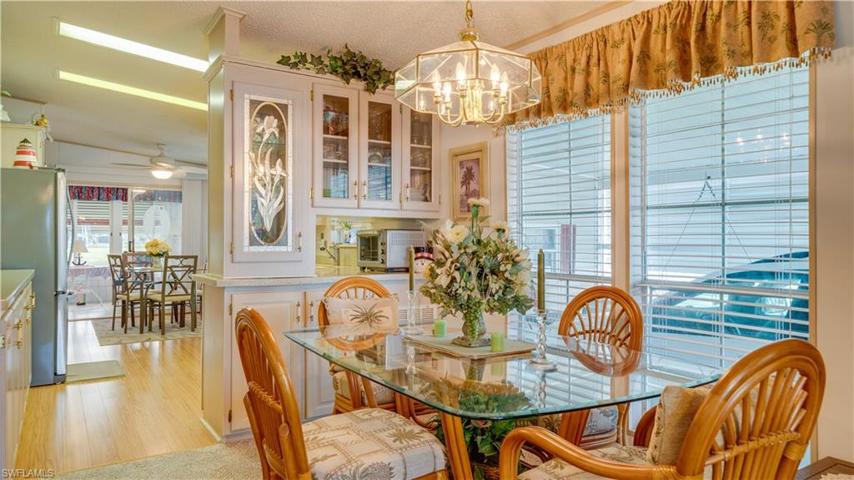 More windows? You bet! Let the Florida sun shine into this home; being sold turnkey with quality furnishings.