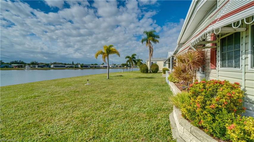 Lighted fountain - straight ahead. To the left - SW Florida sunsets. To the right - those SW Florida sunrises. All of this beauty can be seen from your bonus room, sunroom, and your stamped concrete patio.