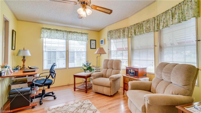 Expecting guests? This lake front bonus room is spacious and can easily accommodate a sleeper sofa...and your home office.