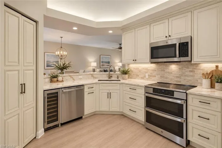 AI-Generated RenderingNEW COUNTER TOP AND NEW BACKSPLASH. NEW STAINLESS APPLIANCES