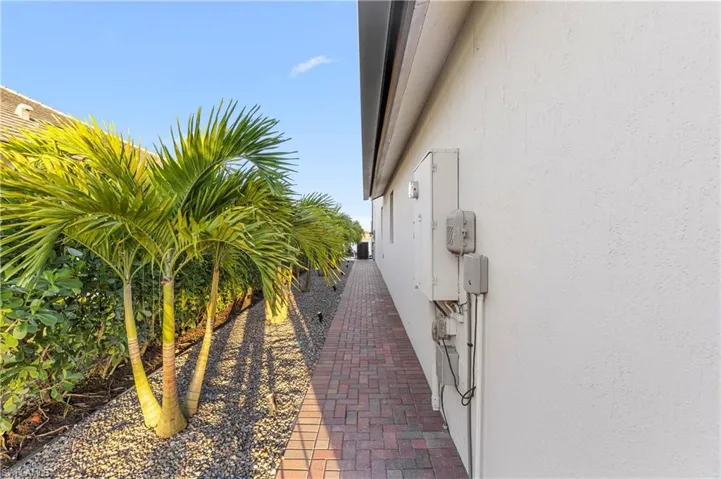 View of property exterior with stucco siding
