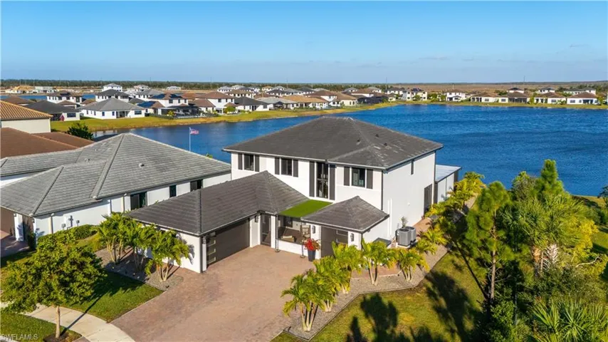 Aerial view of residential area with a large body of water
