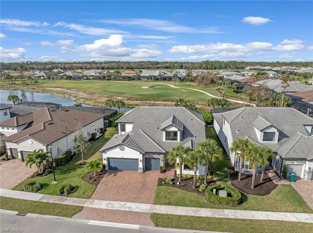 Aerial perspective of community featuring a large body of water