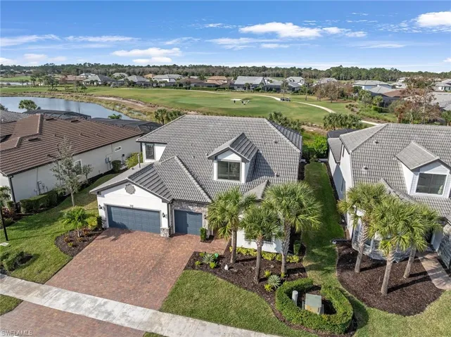Aerial perspective of community featuring a nearby body of water