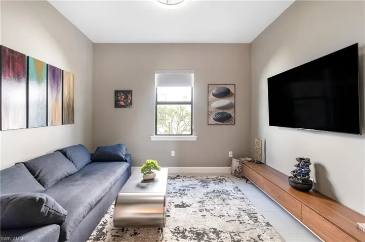 Living room featuring baseboards