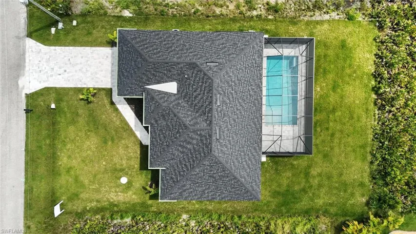 Drone / aerial view of a pool area