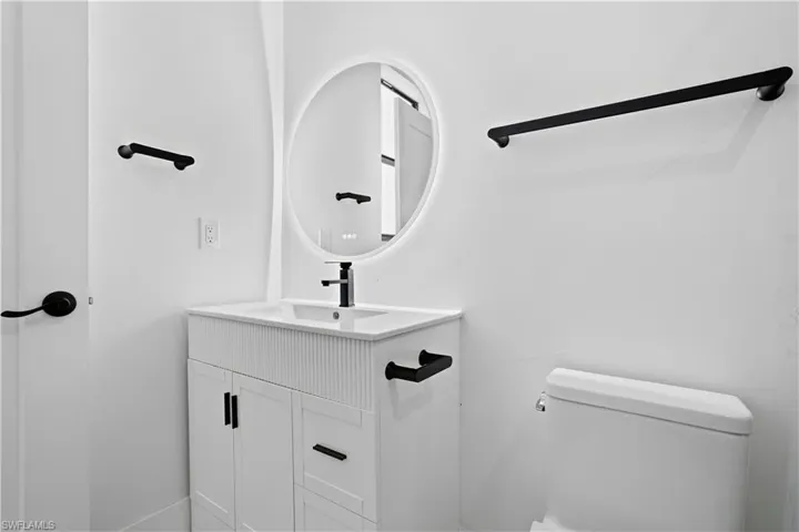 Bathroom featuring toilet and vanity