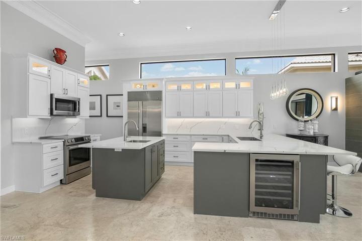 Bosch appliances and wine chiller outfit the bright, airy kitchen