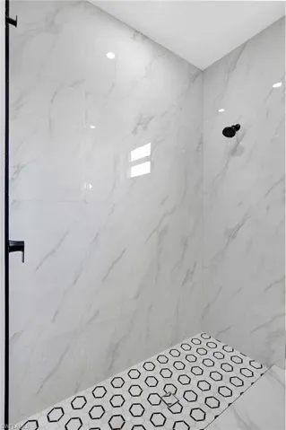 Bathroom with a tile shower