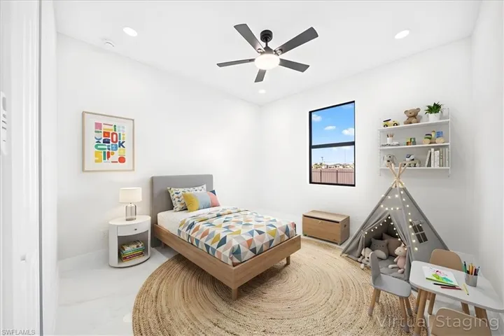Bedroom featuring a ceiling fan and recessed lighting
