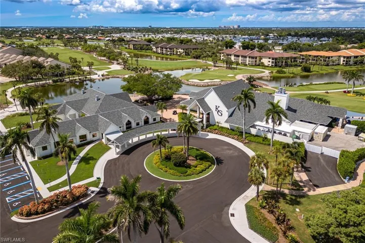 Drone / aerial view of a large body of water and a golf club