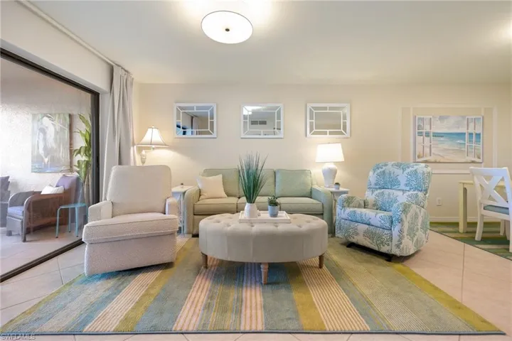 Living area with new coastal inspired furniture.