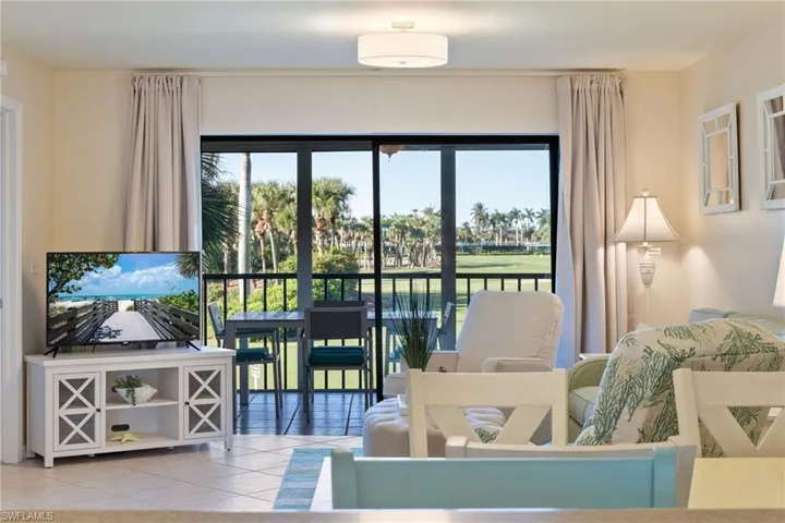 Living area looking out unto screened in lanai.