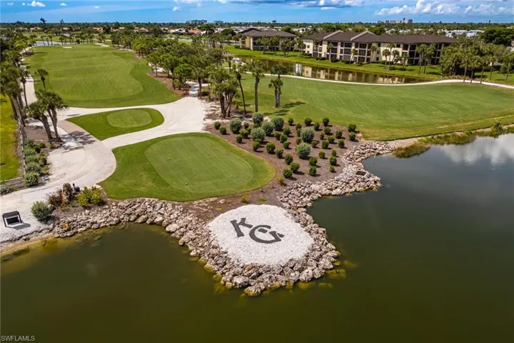 Aerial view of a large body of water and a golf course
