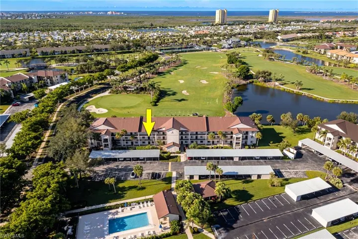 Bird's eye view of a large body of water and a golf course