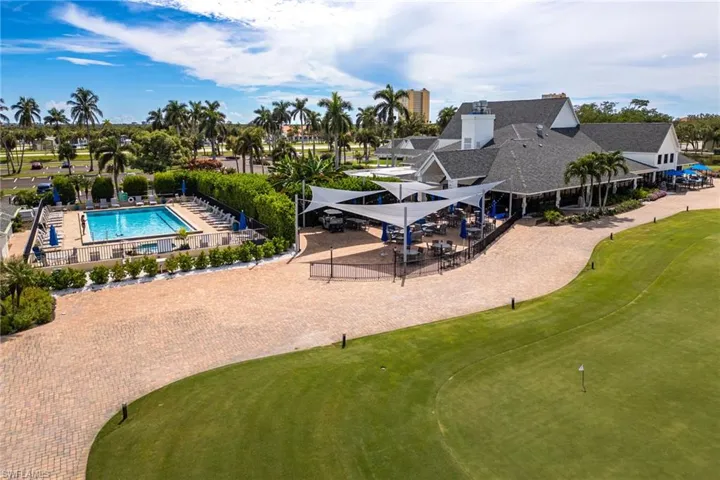 Aerial view of a pool and a local golf course