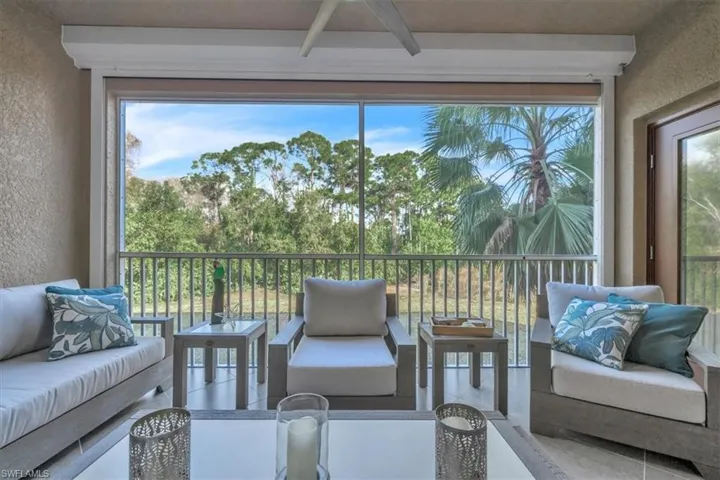 Balcony lanai overlooking a preserve and some view of golf course when trees are trimmed