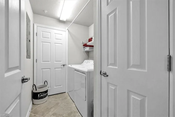 Laundry with shelves and drying rack