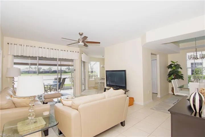 Enjoy the tropical breezes from your triple slider directly off the living room.