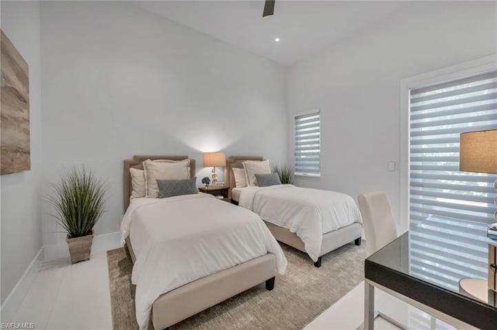 The second of three guest suites is set up for your guests, with their private entrance and huge, walk-in closet.