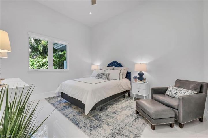 This inviting guest suite has a large, walk-in closet and plenty of space for your guests to enjoy their stay with you.