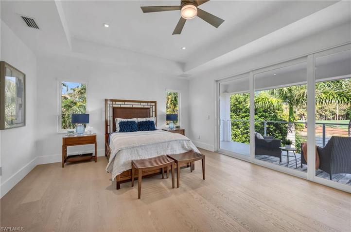One of two guest suites upstairs has a balcony to enjoy those golf views of the Pine Course...