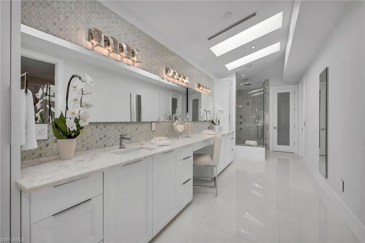 Exquisite bathroom has huge walk-in closet and all the Spa amenities you could wish for.