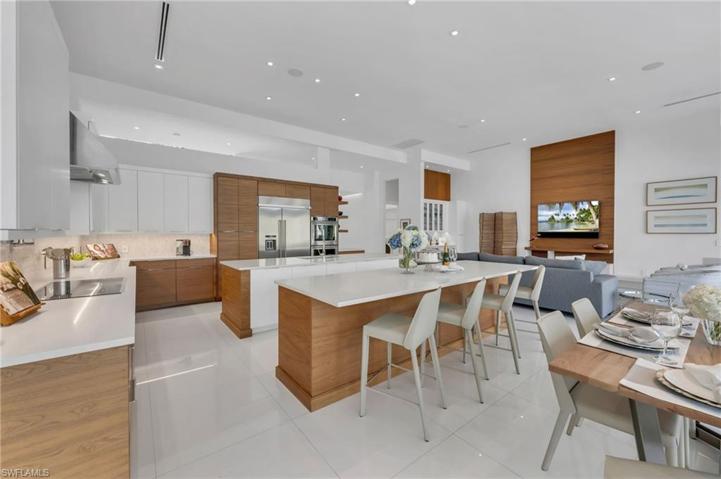 This thoughtfully-designed kitchen has abundant storage and the use of wood adds such warmth and makes the rooms so inviting...