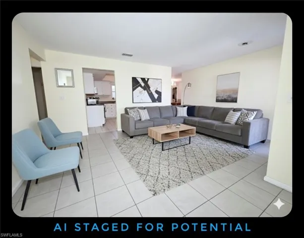 Living room with light tile patterned floors