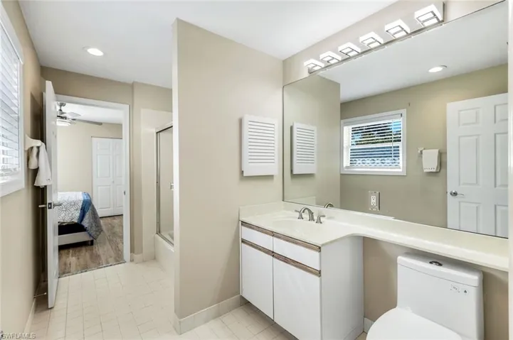 Convenient Jack-and-Jill bath offering shared access between bedrooms, ideal for guests or family living.