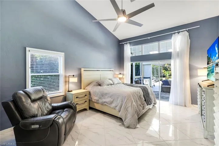 Spacious primary bedroom offering a relaxing retreat with generous layout and abundant natural light.