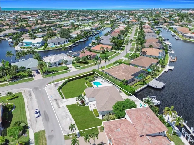 Aerial view of residential area with a large body of water