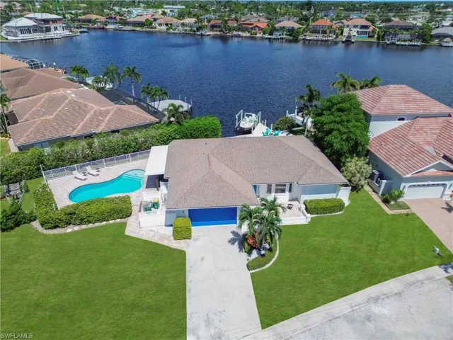 Aerial view of residential area with a large body of water