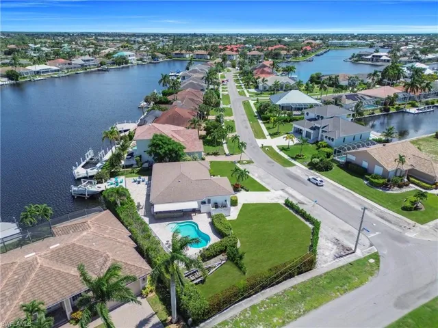 View of property location featuring nearby suburban area and a large body of water
