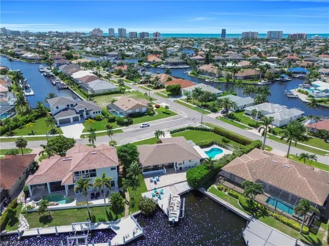 View of urban area featuring a large body of water and nearby suburban area