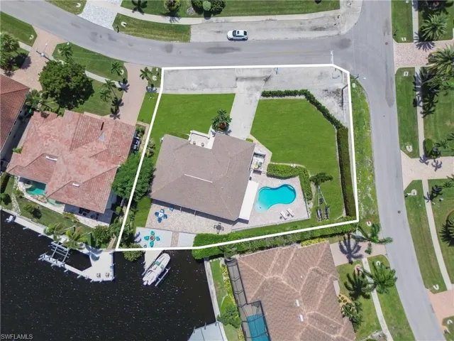 Aerial overview of property's location with property parcel outlined
